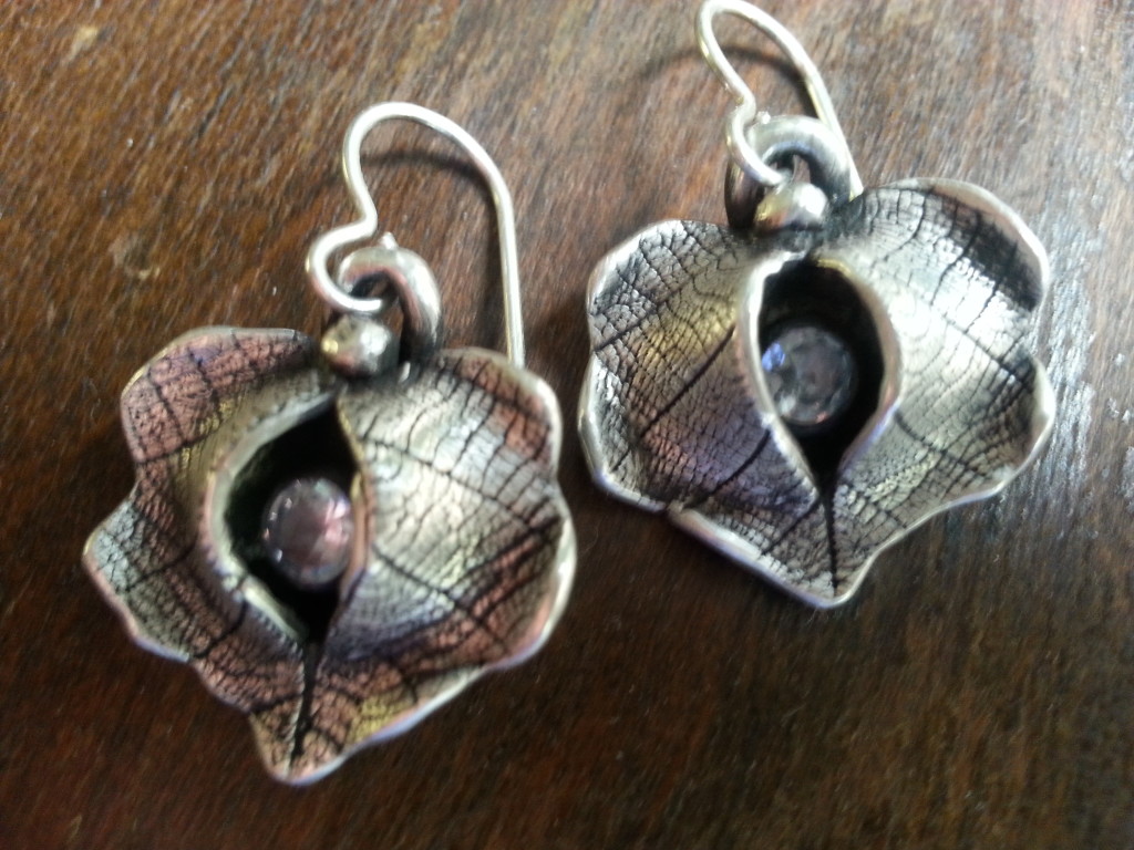 Fine silver and cubic zirconia leaf dangle earrings.