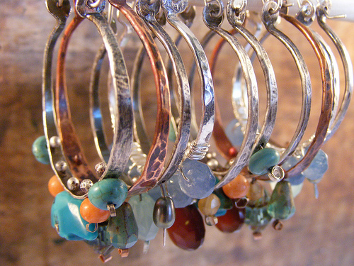 Bohemian style sterling and copper hoops embellished with semi-precious gemstones.